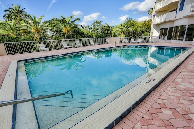 3 Oceans W Blvd Unit 3A7, Daytona Beach Shores, FL 32118 - community pool featuring a patio