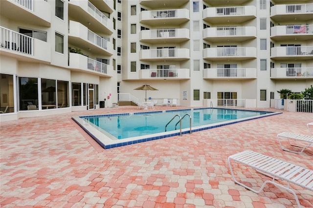 3 Oceans W Blvd Unit 3A7, Daytona Beach Shores, FL 32118 - community pool with a patio