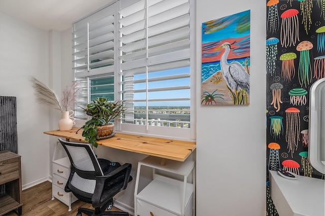 2800 N Atlantic Ave Unit 1409, Daytona Beach, FL 32118 - home office with wood finished floors and baseboards