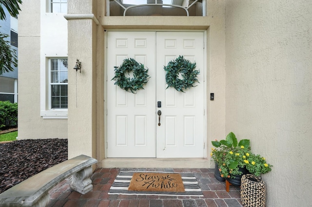 3842 Calliope Ave, Port Orange, FL 32129 - doorway to property featuring stucco siding