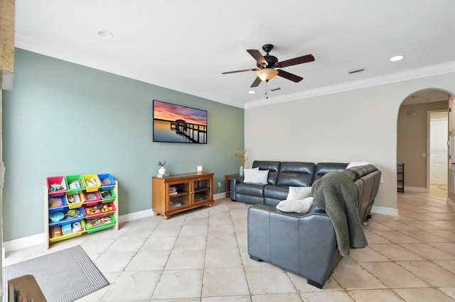 3842 Calliope Ave, Port Orange, FL 32129 - living area featuring arched walkways, ceiling fan, light tile patterned floors, crown molding, and recessed lighting