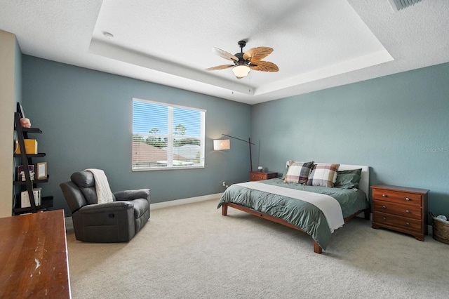 3842 Calliope Ave, Port Orange, FL 32129 - bedroom featuring a raised ceiling, carpet, and a ceiling fan