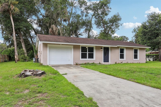 330 Ponce Deleon Blvd, De Leon Springs, FL 32130 - ranch-style home featuring stucco siding, driveway, an attached garage, and a front lawn