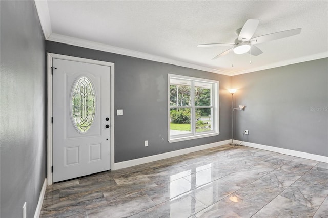 330 Ponce Deleon Blvd, De Leon Springs, FL 32130 - entrance foyer featuring healthy amount of natural light, a ceiling fan, ornamental molding, marble finish flooring, and a textured ceiling