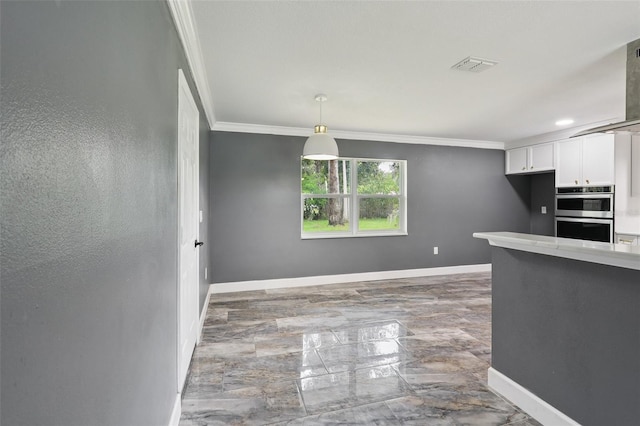 330 Ponce Deleon Blvd, De Leon Springs, FL 32130 - kitchen with stainless steel double oven, ornamental molding, marble tiled flooring, white cabinets, and light countertops