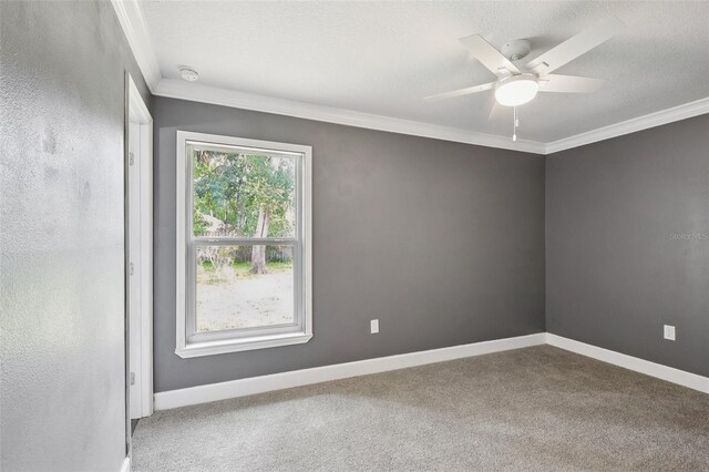 330 Ponce Deleon Blvd, De Leon Springs, FL 32130 - empty room featuring ornamental molding, carpet floors, a ceiling fan, and a smoke detector