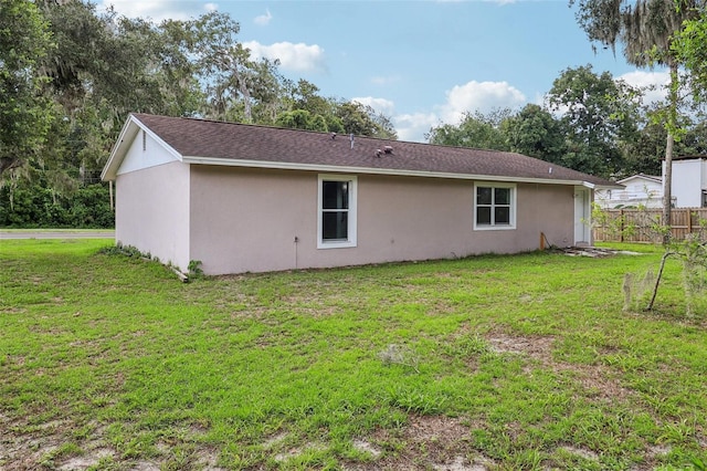 330 Ponce Deleon Blvd, De Leon Springs, FL 32130 - rear view of house with stucco siding