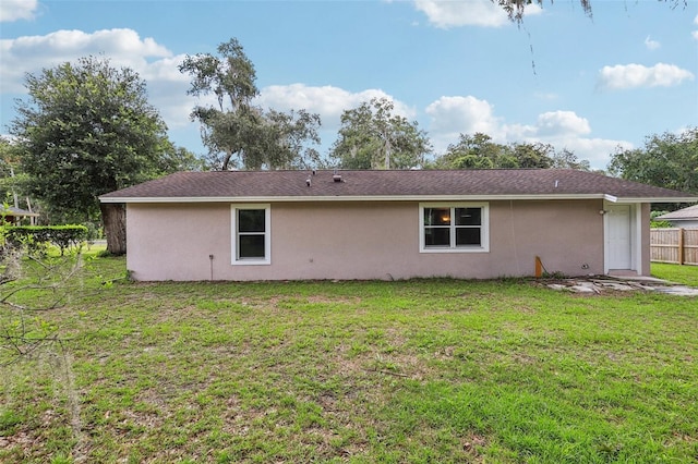 330 Ponce Deleon Blvd, De Leon Springs, FL 32130 - back of property featuring stucco siding