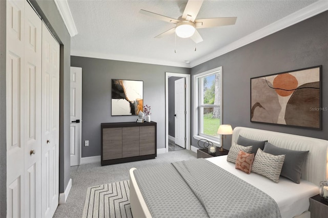 330 Ponce Deleon Blvd, De Leon Springs, FL 32130 - bedroom with light carpet, crown molding, a closet, a textured ceiling, and ceiling fan
