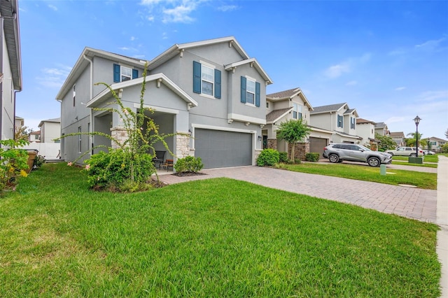 2807 Priego Blvd, Kissimmee, FL 34744 - view of front facade with a residential view, driveway, an attached garage, stucco siding, and stone siding