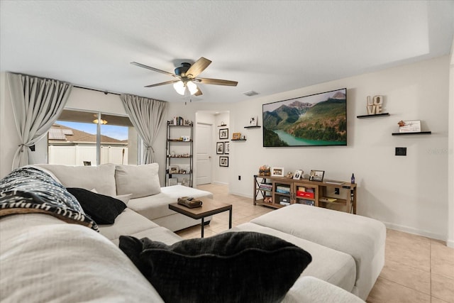 815 Fillmore Ct, Davenport, FL 33837 - living area featuring light tile patterned floors and ceiling fan