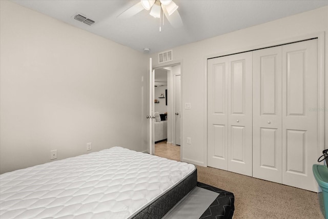 815 Fillmore Ct, Davenport, FL 33837 - carpeted bedroom with a closet and a ceiling fan