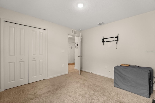 815 Fillmore Ct, Davenport, FL 33837 - unfurnished bedroom featuring carpet and a closet