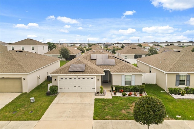 815 Fillmore Ct, Davenport, FL 33837 - view of front of property with a residential view, stucco siding, a garage, and roof with shingles