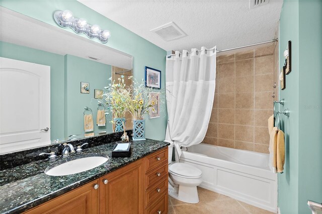 3343 S Atlantic Ave Unit 601, Daytona Beach Shores, FL 32118 - full bathroom featuring vanity, shower / tub combo with curtain, and tile patterned floors
