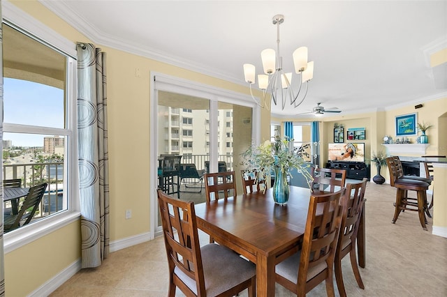 3343 S Atlantic Ave Unit 601, Daytona Beach Shores, FL 32118 - dining area with a chandelier, crown molding, light tile patterned flooring, plenty of natural light, and ceiling fan
