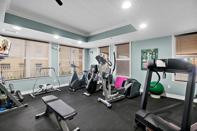 3343 S Atlantic Ave Unit 601, Daytona Beach Shores, FL 32118 - workout area with crown molding, a textured ceiling, recessed lighting, and a tray ceiling