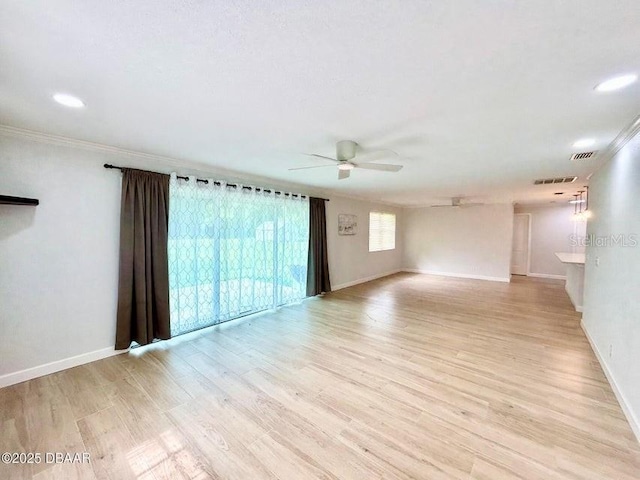 2017 Old Daytona Rd, Port Orange, FL 32128 - empty room featuring a ceiling fan, light wood finished floors, ornamental molding, and recessed lighting