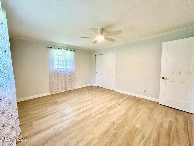 2017 Old Daytona Rd, Port Orange, FL 32128 - unfurnished bedroom featuring ornamental molding, wood finished floors, and a ceiling fan