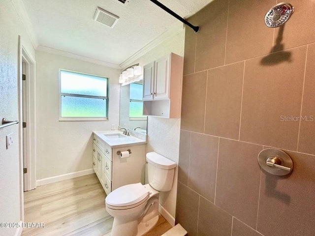 2017 Old Daytona Rd, Port Orange, FL 32128 - full bath featuring ornamental molding, vanity, wood finished floors, and a shower