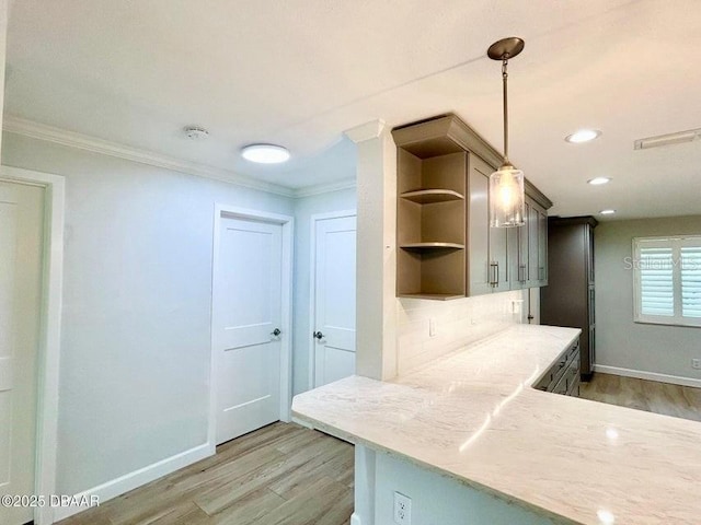 2017 Old Daytona Rd, Port Orange, FL 32128 - kitchen with open shelves, light wood-style floors, crown molding, decorative light fixtures, and recessed lighting