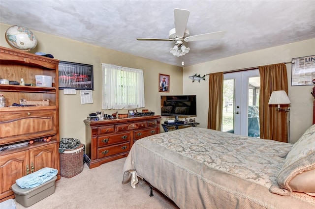 2345 Tomoka Farms Rd, Port Orange, FL 32128 - bedroom with carpet flooring, access to exterior, multiple windows, and a ceiling fan