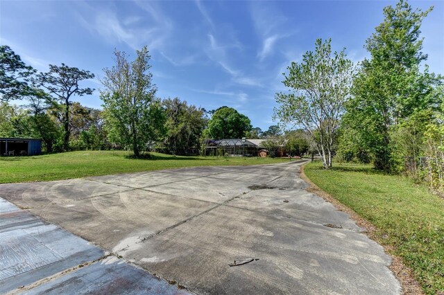 2345 Tomoka Farms Rd, Port Orange, FL 32128 - view of street featuring view of scattered trees