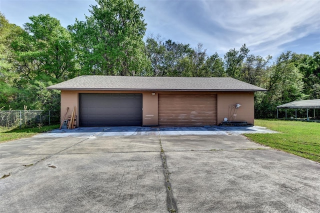 2345 Tomoka Farms Rd, Port Orange, FL 32128 - detached garage featuring view of wooded area