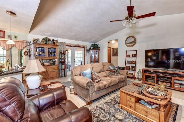 2345 Tomoka Farms Rd, Port Orange, FL 32128 - living room featuring lofted ceiling, a ceiling fan, tile patterned floors, and french doors
