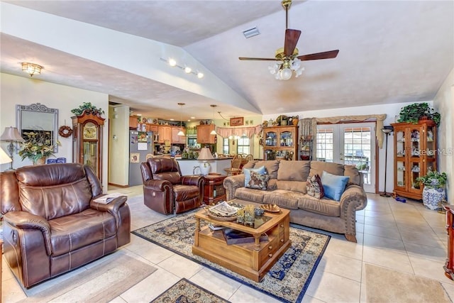 2345 Tomoka Farms Rd, Port Orange, FL 32128 - living room featuring lofted ceiling, ceiling fan, light tile patterned floors, and french doors