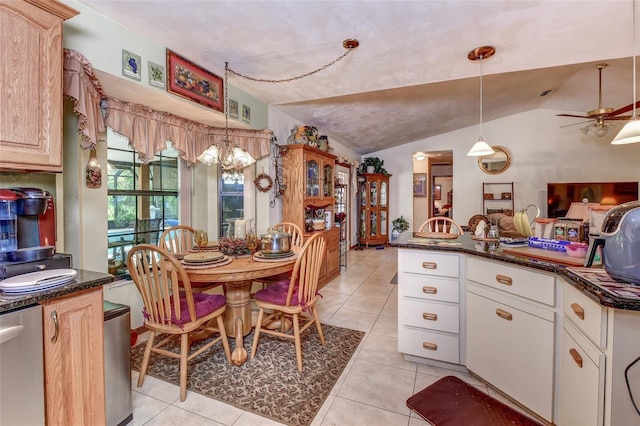 2345 Tomoka Farms Rd, Port Orange, FL 32128 - dining space with vaulted ceiling, light tile patterned floors, ceiling fan, and a chandelier