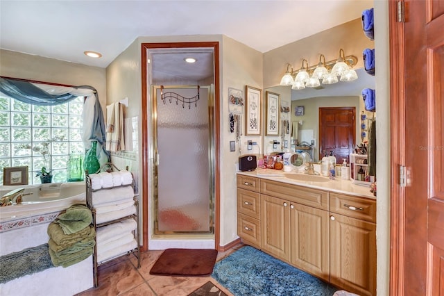 2345 Tomoka Farms Rd, Port Orange, FL 32128 - bathroom with vanity, a shower stall, a bath, and tile patterned floors