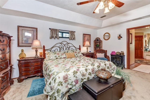 2345 Tomoka Farms Rd, Port Orange, FL 32128 - carpeted bedroom with a ceiling fan and connected bathroom