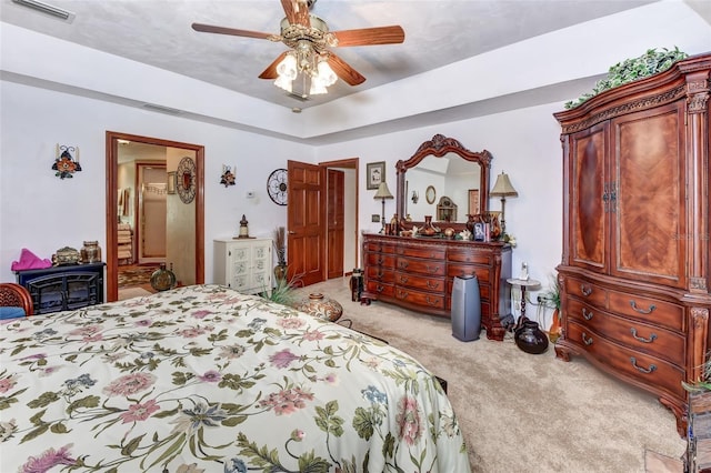 2345 Tomoka Farms Rd, Port Orange, FL 32128 - carpeted bedroom featuring a ceiling fan and connected bathroom