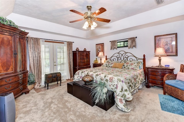 2345 Tomoka Farms Rd, Port Orange, FL 32128 - bedroom featuring light colored carpet, french doors, access to outside, and a ceiling fan