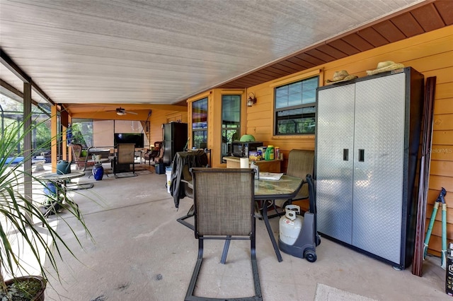 2345 Tomoka Farms Rd, Port Orange, FL 32128 - view of patio featuring outdoor dining area and ceiling fan