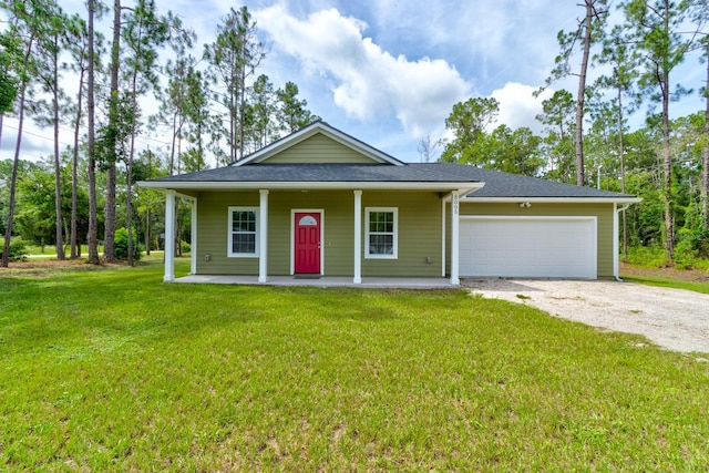 5005 Joseph St, Hastings, FL 32145 - view of front of home featuring driveway, a garage, covered porch, a front yard, and roof with shingles