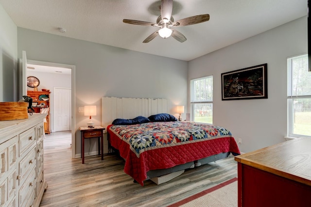 5005 Joseph St, Hastings, FL 32145 - bedroom featuring light wood finished floors and ceiling fan