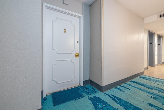 2800 N Atlantic Ave Unit 210, Daytona Beach, FL 32118 - view of exterior entry featuring elevator