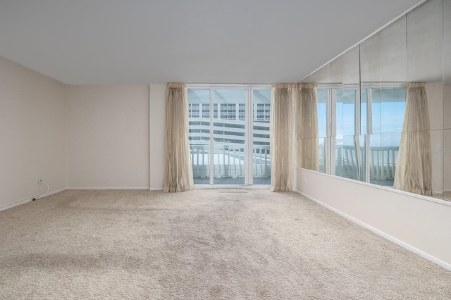 2800 N Atlantic Ave Unit 210, Daytona Beach, FL 32118 - carpeted empty room with plenty of natural light