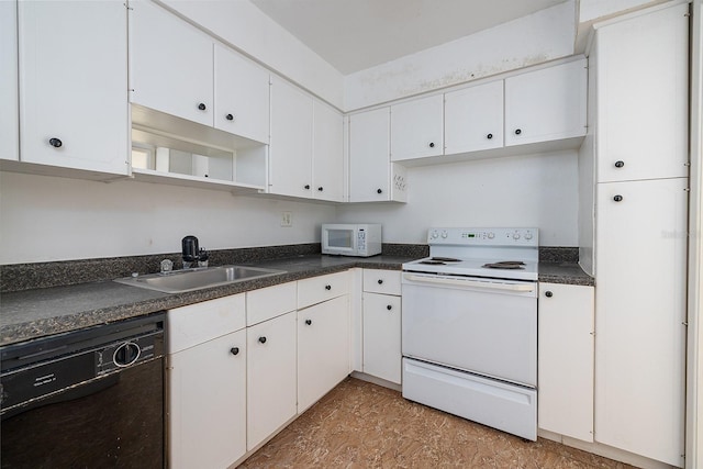 2800 N Atlantic Ave Unit 210, Daytona Beach, FL 32118 - kitchen with white appliances, dark countertops, white cabinets, and open shelves