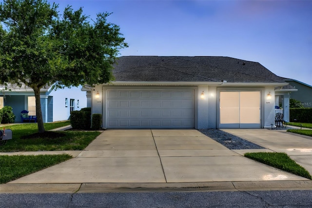 1636 Areca Palm Dr, Port Orange, FL 32128 - view of front of property with concrete driveway, stucco siding, and a shingled roof
