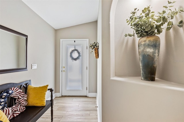 1636 Areca Palm Dr, Port Orange, FL 32128 - entrance foyer with light wood finished floors and vaulted ceiling