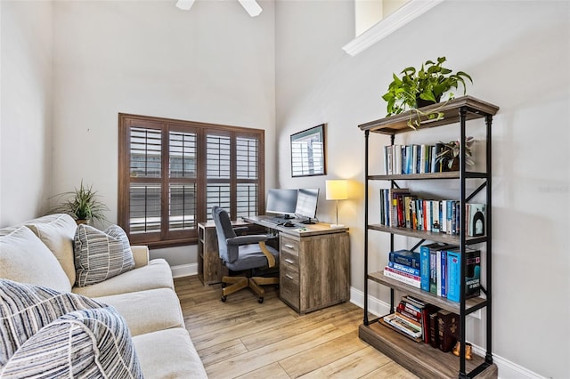 1636 Areca Palm Dr, Port Orange, FL 32128 - office featuring wood finished floors, a towering ceiling, and ceiling fan