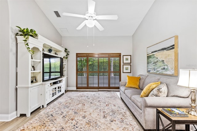 1636 Areca Palm Dr, Port Orange, FL 32128 - living room featuring light wood-style flooring, a ceiling fan, and lofted ceiling