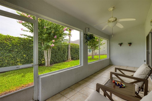 1636 Areca Palm Dr, Port Orange, FL 32128 - sunroom featuring a ceiling fan and lofted ceiling