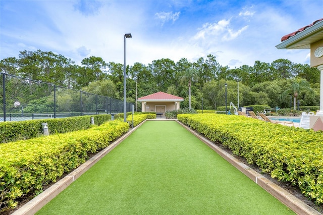 1636 Areca Palm Dr, Port Orange, FL 32128 - surrounding community with a game area and a swimming pool