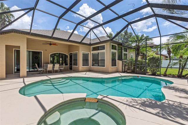 6710 Merryvale Ln, Port Orange, FL 32128 - view of pool with a patio, a pool with connected hot tub, a ceiling fan, and glass enclosure