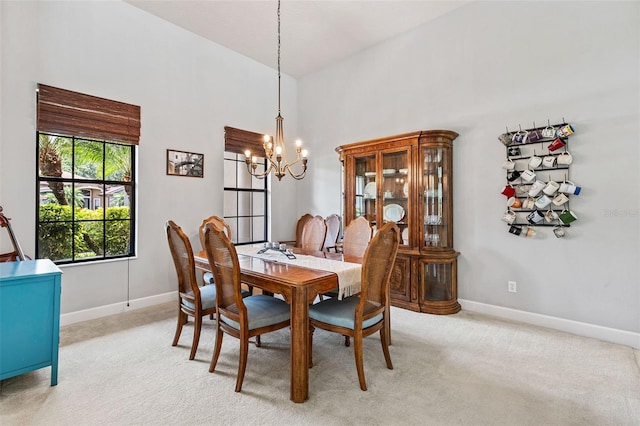 6710 Merryvale Ln, Port Orange, FL 32128 - dining space with a chandelier and light carpet