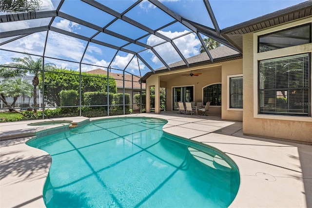 6710 Merryvale Ln, Port Orange, FL 32128 - view of pool with a patio, ceiling fan, a pool with connected hot tub, and glass enclosure